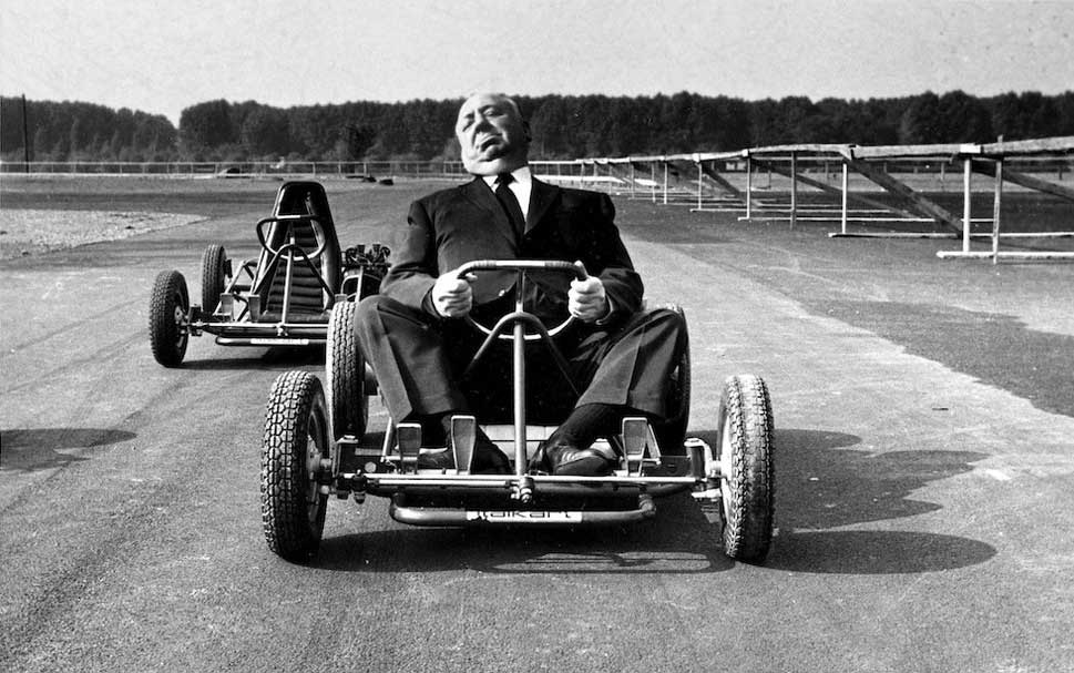 Alfred Hitchcock riding a go kart 1960