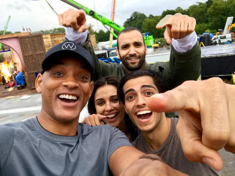 the main cast of guy ritchies aladdin featured in first photo from the set of the film2