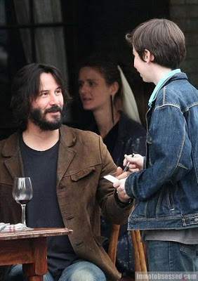 Keanu Reeves beard nyc drinking wine signing autographs taking pictures with fans. 05 june 2009 4